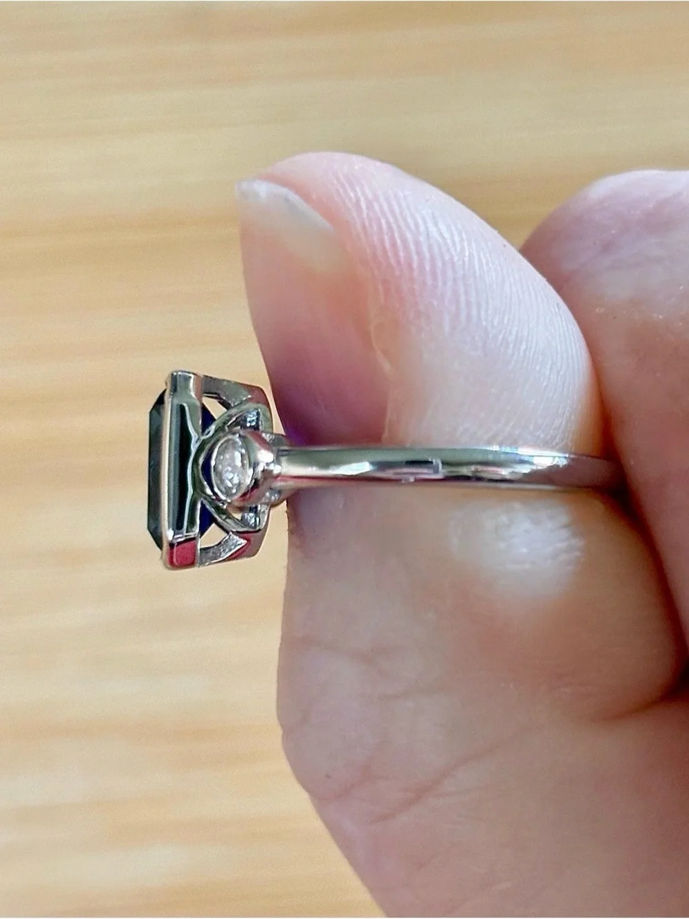 A certified 3ct lab-grown blue sapphire & .20ctw Moissanite ring, in 925 or 935!